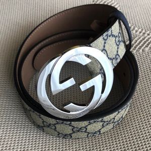 Gucci belt   Blue/beige, silver buckle.